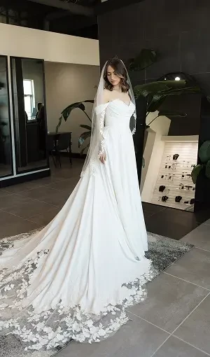 Model wearing a white bridal gown